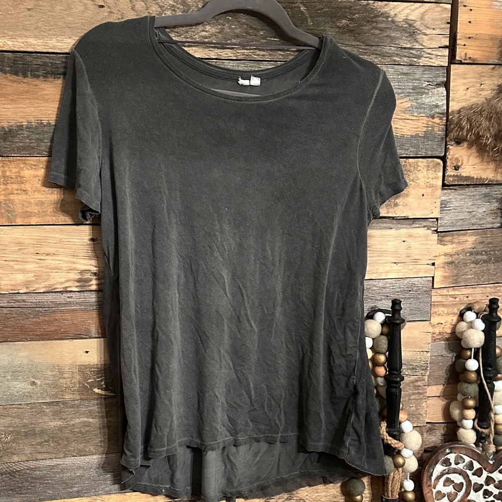Free people ? Not sure but it screams the brand no tag .. very soft vintage